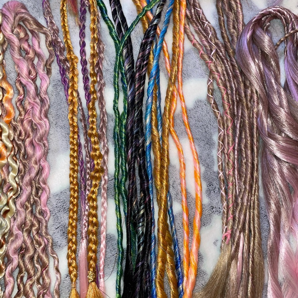 Synthetic Dreadlock extensions •variety of styles•